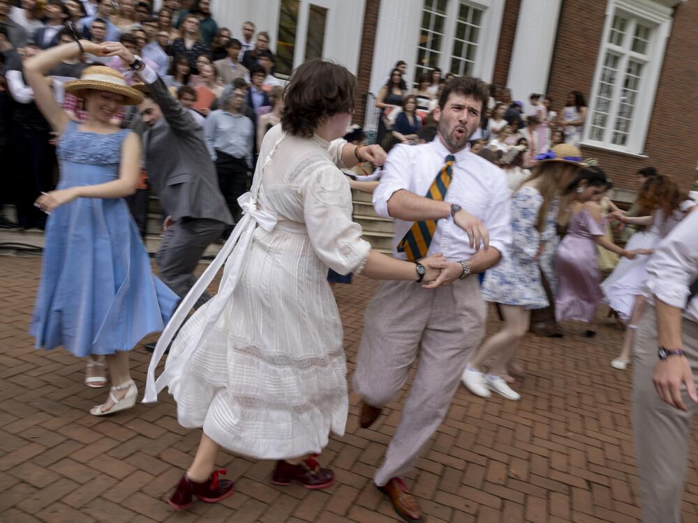 Attendees swing dance as the crowds await the croquet teams' arrival.
