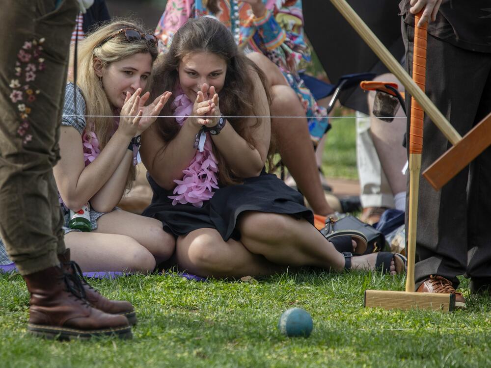 Brynn Myers and Lindsay Irmiter, juniors at St. John's College, wiggle their 