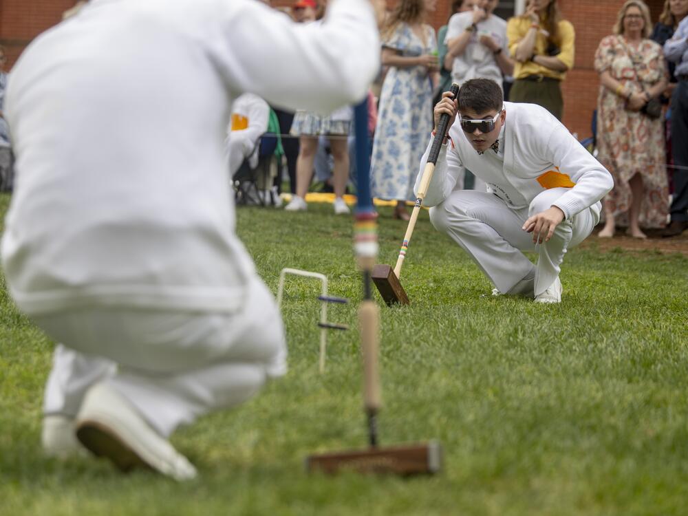 The Naval Academy's Andrew Wilkinson lines up his shot.