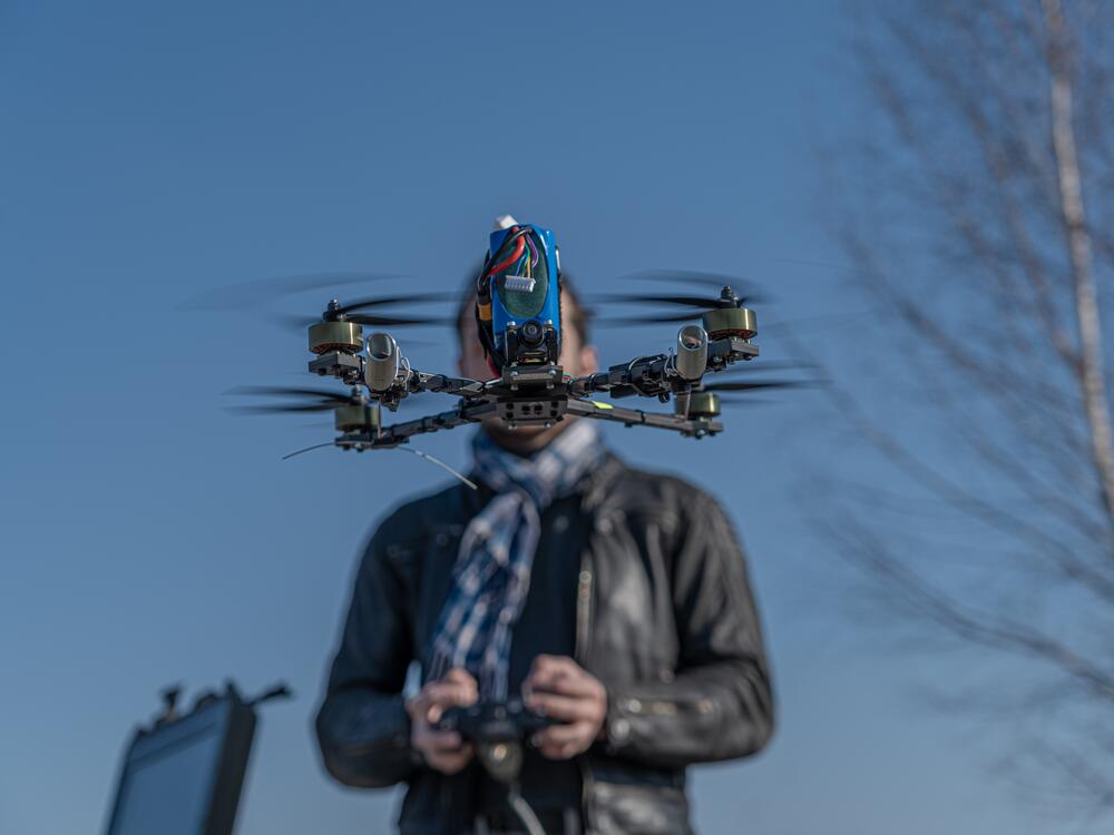 Oleksii Babenko, the CEO of Vyriy drones, test flies one of his drones in a field outside Kyiv. His company recently announced that its drones are 100% made in Ukraine.