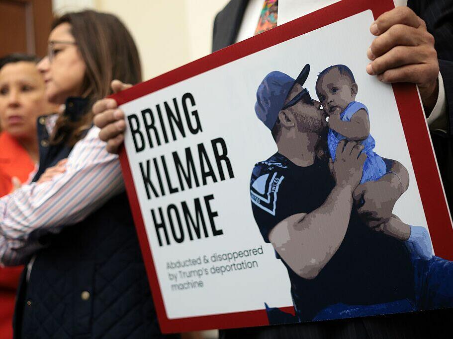 A member of the Congressional Hispanic Caucus holds a picture of Kilmar Abrego Garcia during a news conference to discuss his arrest and deportation on Apr. 9, 2025 in Washington, DC.