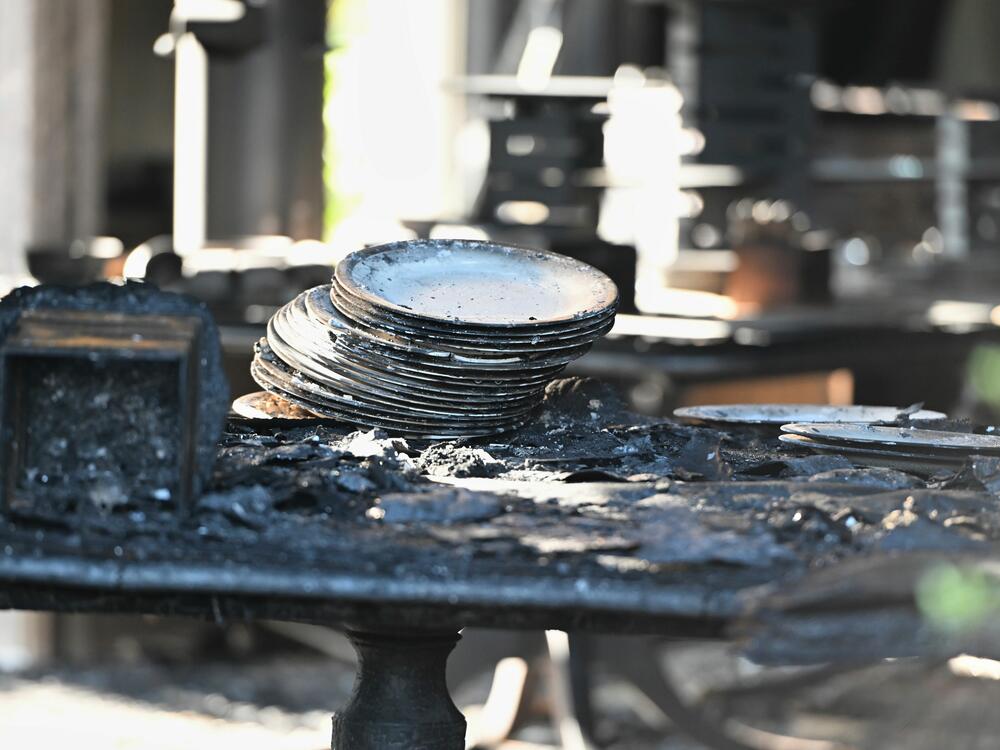 Charred tables and dishes are visible inside the Pennsylvania governor's official residence after a man was arrested in an alleged arson that forced Gov. Shapiro, his family and guests to flee in the middle of the night on the Jewish holiday of Passover on Sunday.