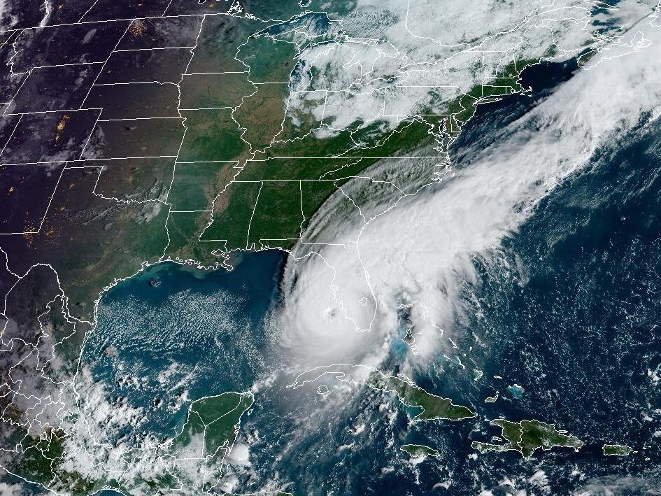 NOAA satellites captured an image of 2022's Hurricane Ian. Data from those satellites and other NOAA efforts feeds into hurricane forecasts, as well as efforts to understand weather, climate, and fisheries changes. A proposed budget for the agency would slash more than 25% of its funding.