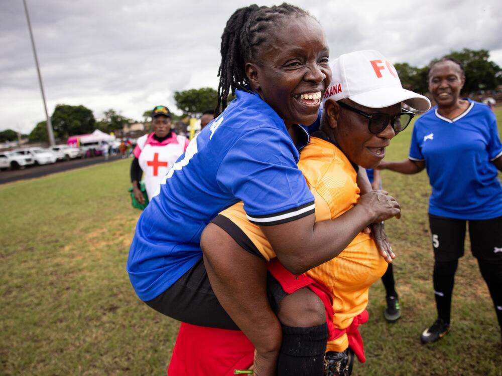 Lillian Zungu (in blue), is the captain of the Zambian team (and a professional chef). When the team bus petered out en route to the tournament, she says, 