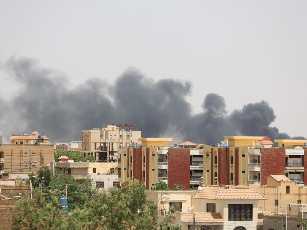 Smoke rises after the first strikes of the war on April 17, 2023.