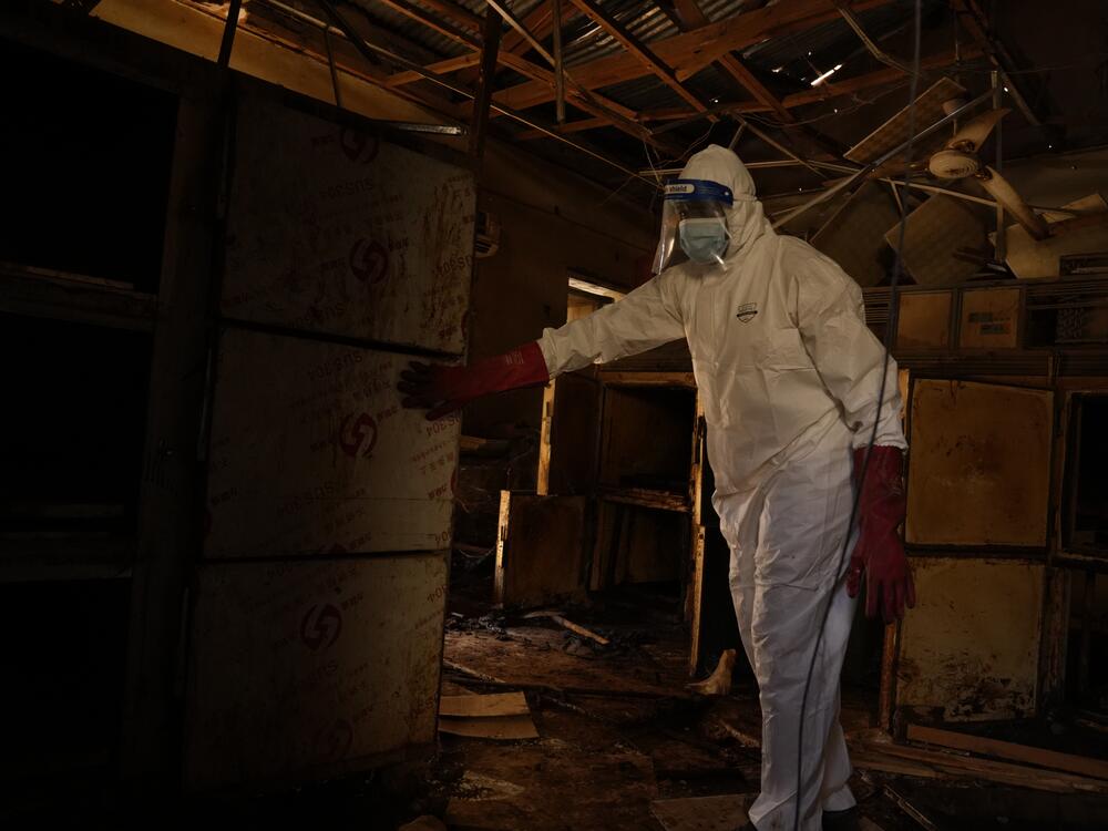 The Rapid Support Forces looks for bodies to move to a cemetery for a proper burial in Omdurman, in 2024.
