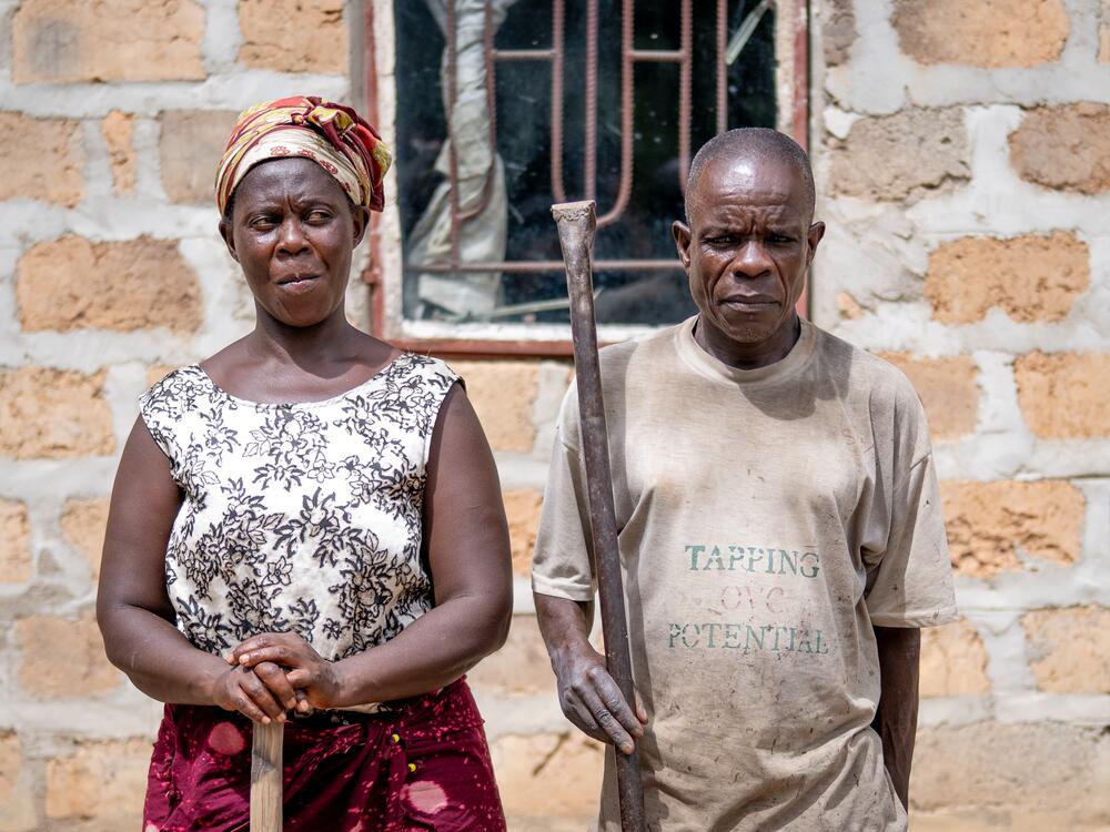 Farmers Alice Nyandwa and Kabamda Willies say that they now must walk three to four hours each way to a government-run HIV clinic. Even when they get to the clinic, they sometimes can't get their medications because the volunteer staff — who used to receive stipends as part of U.S. aid — aren't there anymore.