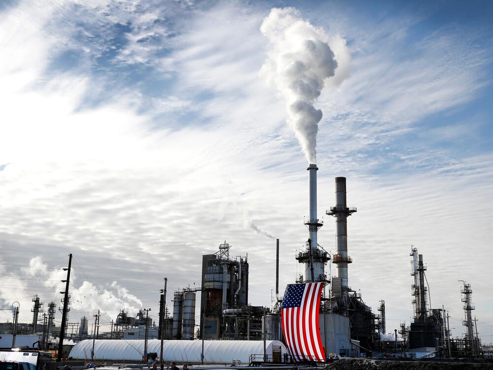 A flag hangs on the side of the Andeavor Mandan Refinery in Mandan, N.D., in 2017.