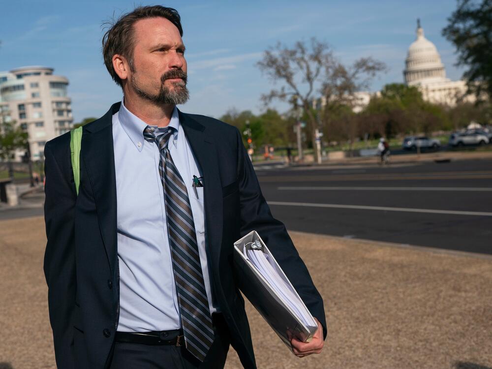Daniel Matheson, a lawyer for the Federal Trade Commission, departs following the first day of a historic antitrust trial about Meta CEO Mark Zuckerberg's intentions in acquiring Instagram, at Barrett Prettyman United States Court House in Washington, Monday, April 14, 2025. (AP Photo/Nathan Howard)