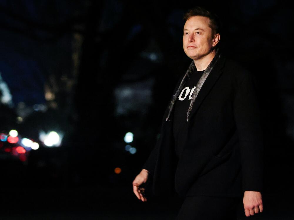 White House senior adviser Elon Musk walks to the White House after landing in Marine One with President Trump on March 9.