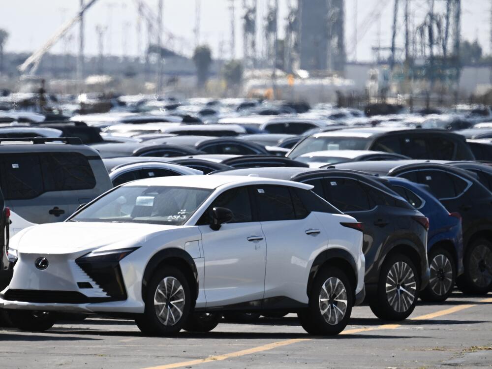 Toyota and Lexus cars unloaded from ships sit parked at the Toyota Logistics Services Inc. automotive processing terminal at the Port of Long Beach in Long Beach, Calif., on April 10.