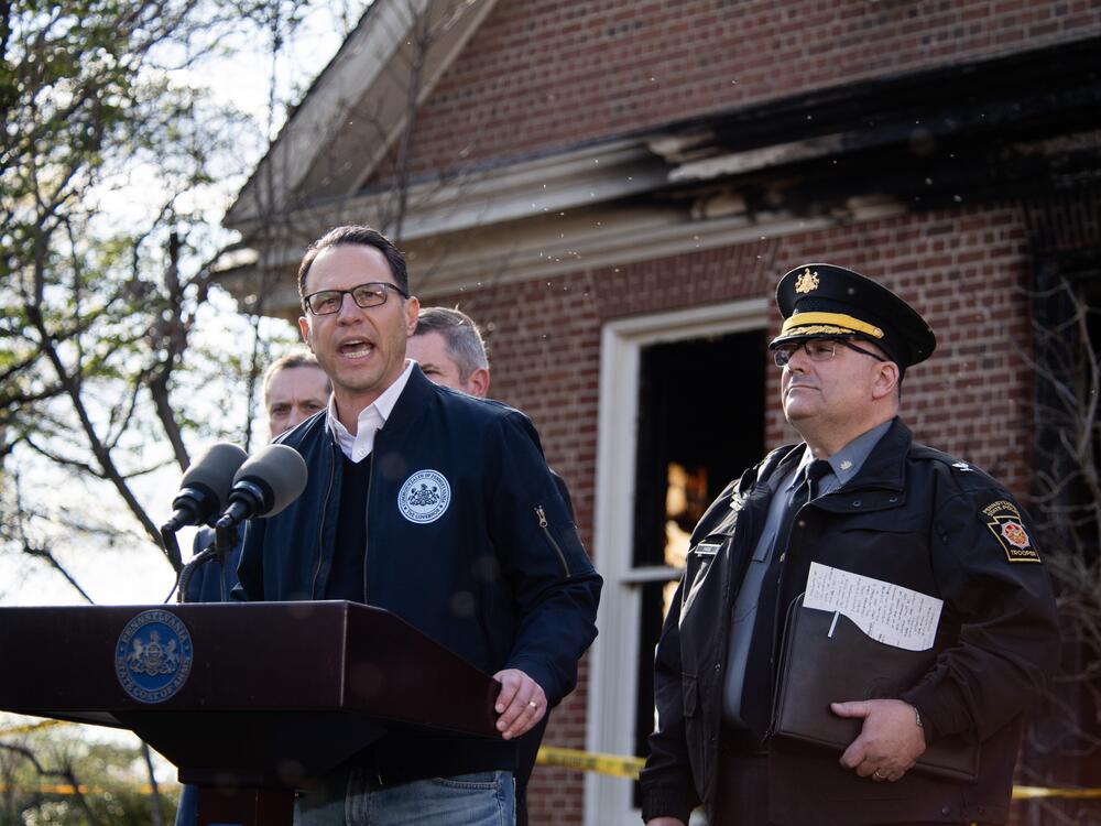 Pennsylvania Gov. Josh Shapiro speaks during a press conference outside the governor's residence in Harrisburg after a Sunday morning arson attack.