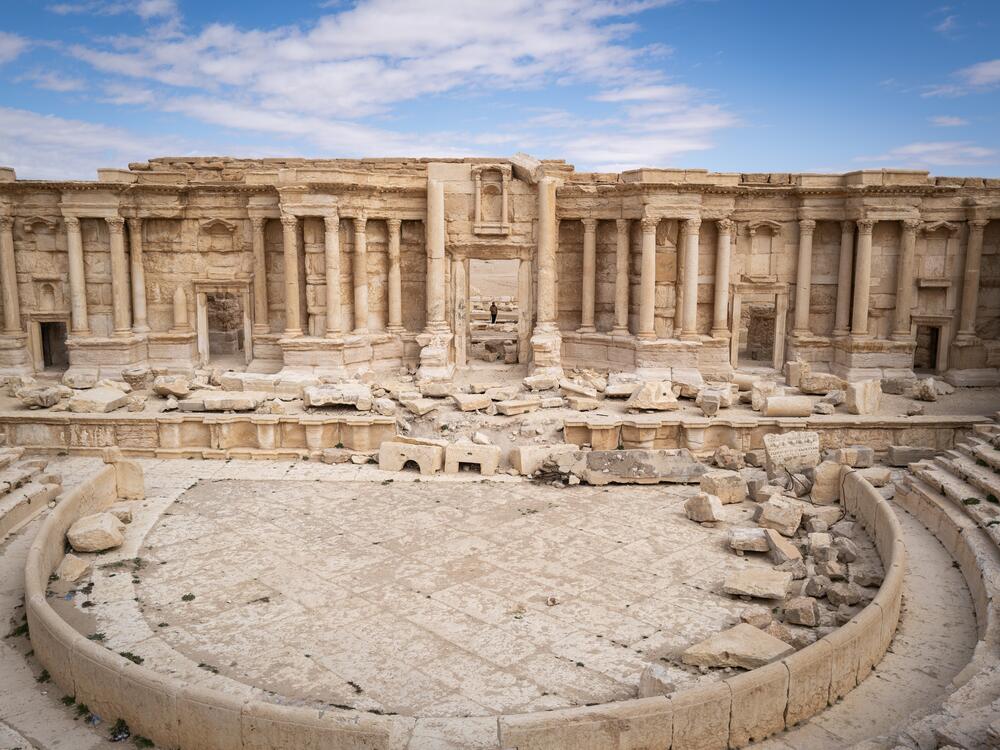 Palmyra's ancient theater, seen on Feb. 21, was used by ISIS for public executions during the group's takeover of the region.  Syrians are hoping for a return of tourists now that the country has reopened to international visitors after the fall of the regime of Bashar al-Assad to rebel fighters last December.