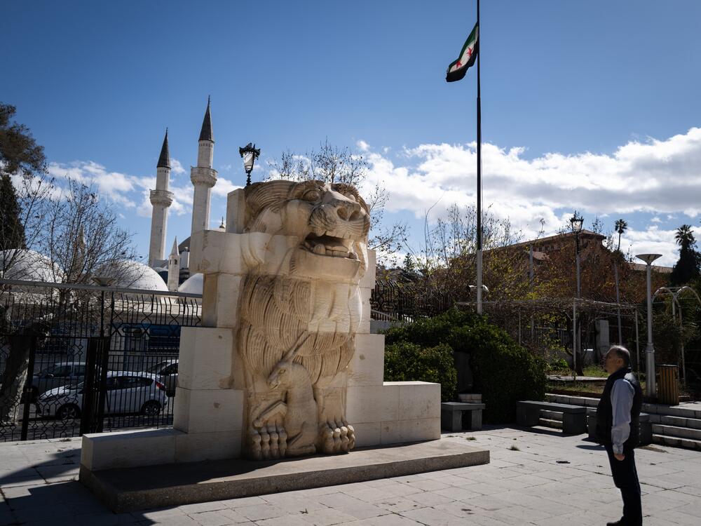 The 11-foot-high stone Lion of al-Lat, pieced back together after ISIS damaged it in Palmyra, is now on display in the Damascus museum's garden amid orange trees filled with songbirds, Feb. 20.