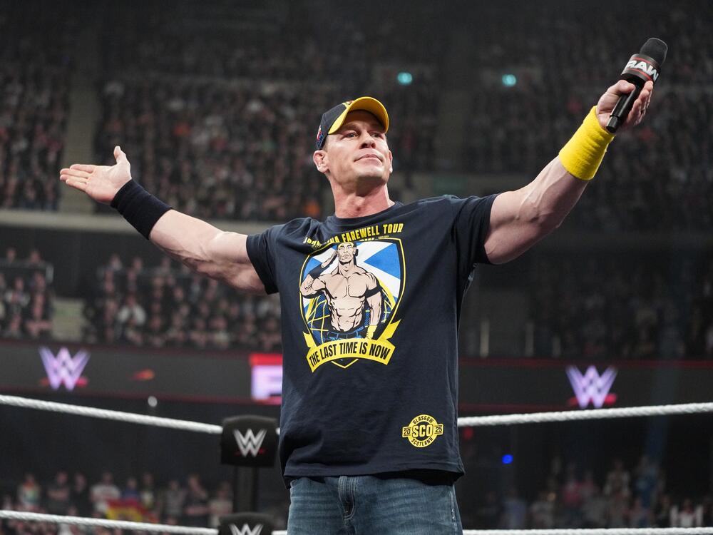 John Cena addresses the crowd during <em>Monday Night RAW</em> at The OVO Hydro on March 24 in Glasgow, Scotland.
