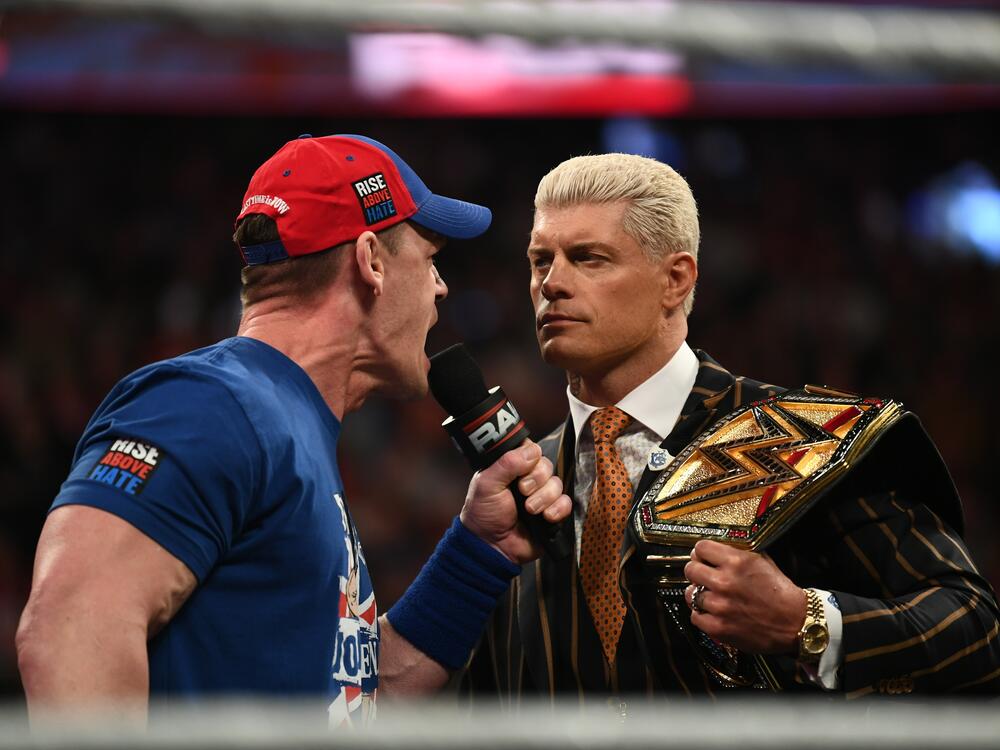 John Cena (left) in ring and Cody Rhodes during <em>Monday Night RAW</em> at The O2 Arena on March 31, 2025 in London, England.
