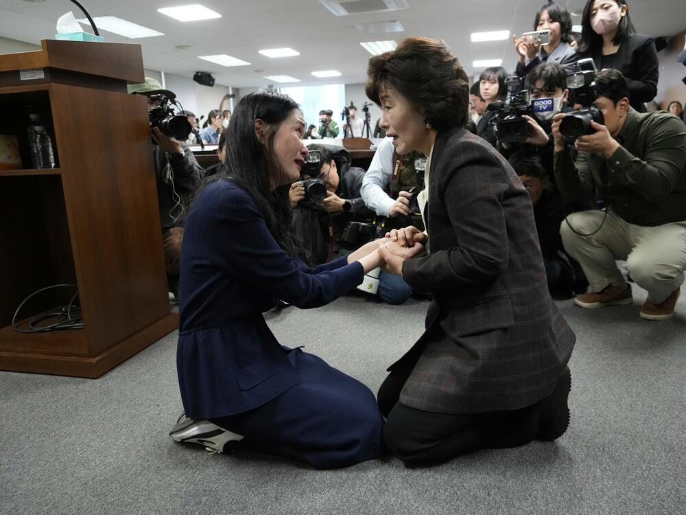 Truth and Reconciliation Commission Chairperson Park Sun Young (right) comforts adoptee Yooree Kim during a press conference in Seoul, South Korea, on March 26. Before the 1990s, South Korea was the top country for international adoptions to the U.S. A 2000 U.S. law's age cutoff makes the issue of adoptees without citizenship especially pertinent to those from South Korea.