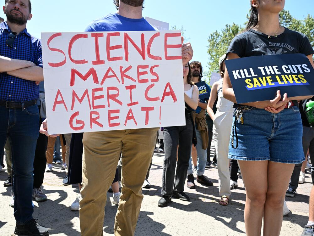 Students, researchers and demonstrators rally during a protest against the Trump administration's funding cuts on research, health and higher education at the University of California Los Angeles on April 8.