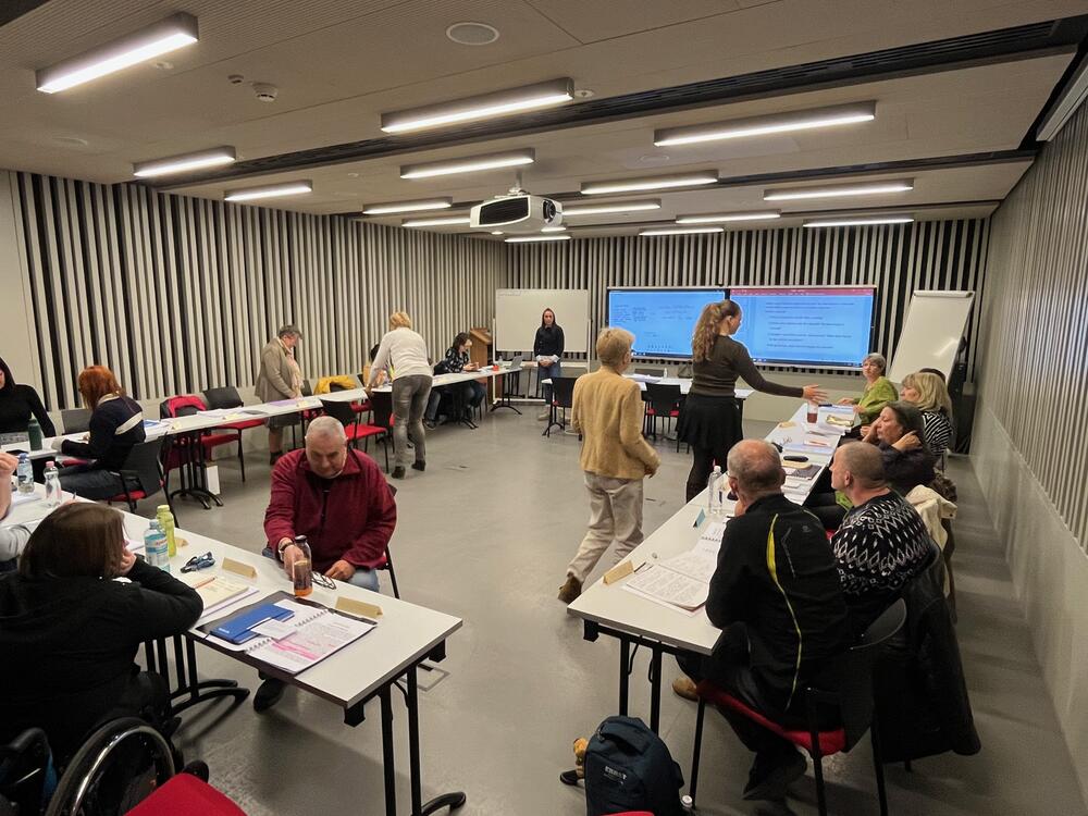 An adult night class at Budapest's Central European University discusses what makes a dictatorship.