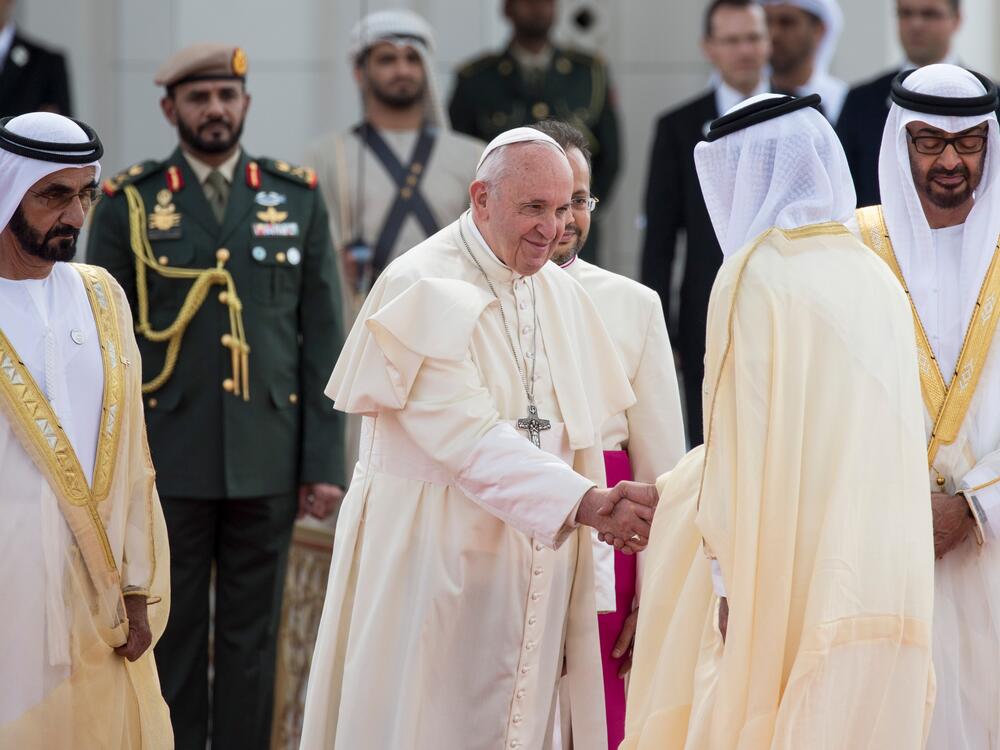 Pope Francis is welcomed by Dubai's Sheikh Mohammed bin Rashid Al-Maktoum (left) and Abu Dhabi's Crown Prince Mohammed bin Zayed al-Nahyan (right) upon his arrival to the presidential palace on Feb. 4, 2019. The moment marked the first ever papal visit to the Arab Peninsula.