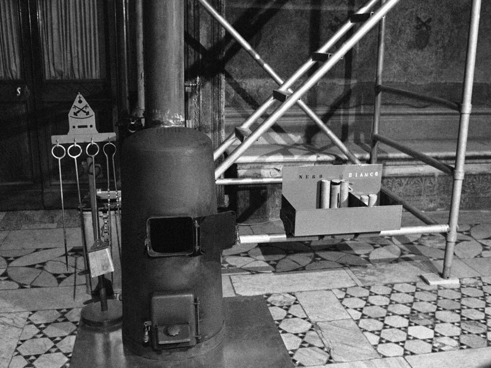 A close up of the stove in which the cardinals will burn their ballots during the election for a new pontiff in the Sistine chapel in Vatican City shown October 1978. At right a container with chemicals to produce white and black smoke in the time of burning to say if a new pope was named or not. (AP Photo)