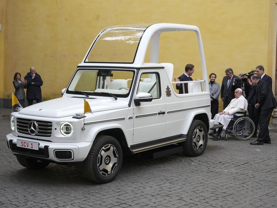 Pope Francis is presented a new fully electric popemobile, at the Vatican, Wednesday, Dec. 4, 2024.