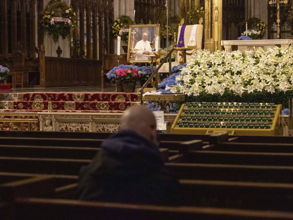 A parishioner prays at St. Patrick's Cathedral, Monday, April 21, 2025, in New York.