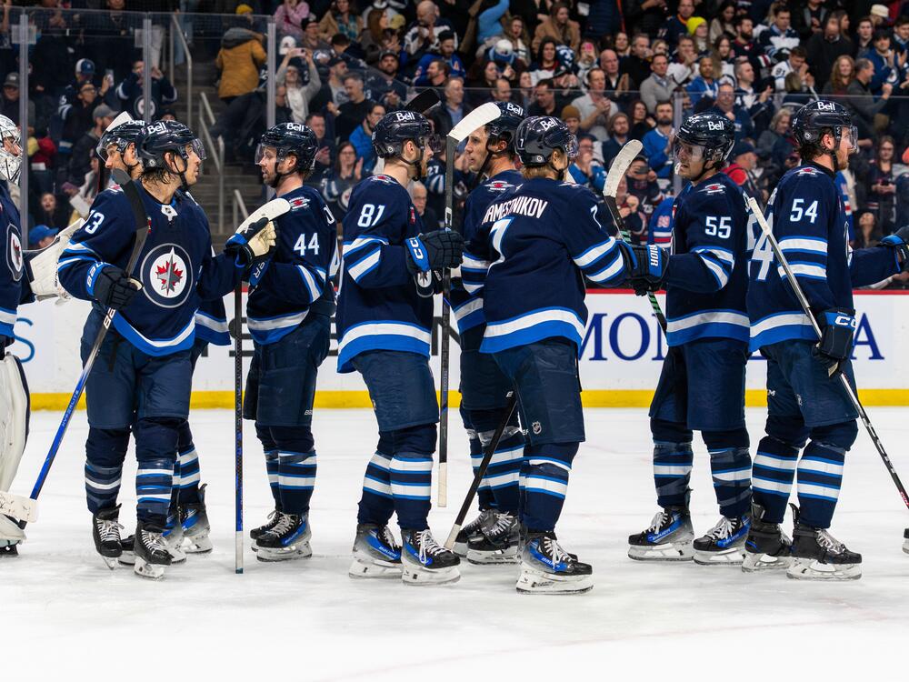 The Winnipeg Jets celebrate a win against the New York Rangers last month. Winnipeg is a long-suffering hockey town. But this year, the Jets finished 56-22-4, the best record in hockey. And the pressure is on to deliver.