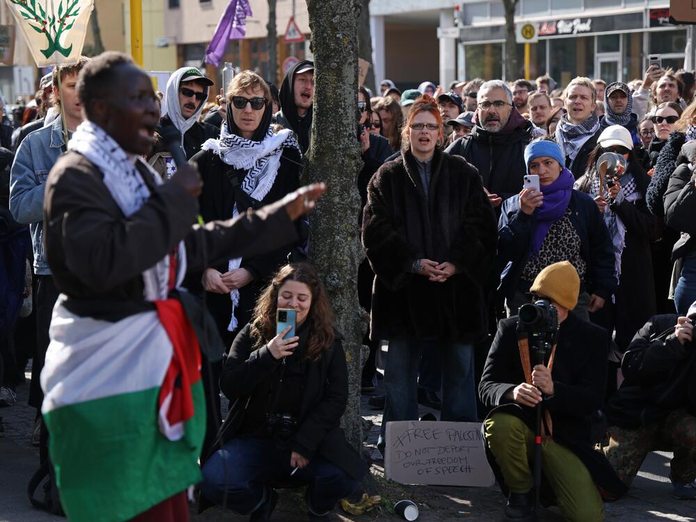 Demonstrators protest in Berlin against the possible deportation of four foreign pro-Palestinian activists from Germany on April 7. The four, including two from Ireland, one from Poland and one from the United States, face order to leave relating to their participation in a protest at Berlin's Free University last year over Israel's invasion of Gaza. City authorities have ordered the four to leave Germany or face deportation.