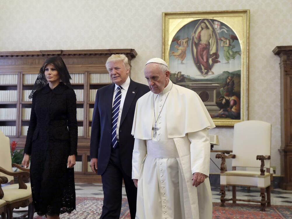 Pope Francis walks with President Trump and first lady Melania Trump during a private audience at the Vatican on May 24, 2017.