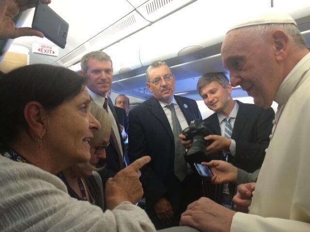 Then-NPR correspondent Sylvia Poggioli speaks with Pope Francis on a flight from Rome to Havana, on Sept. 19, 2015.