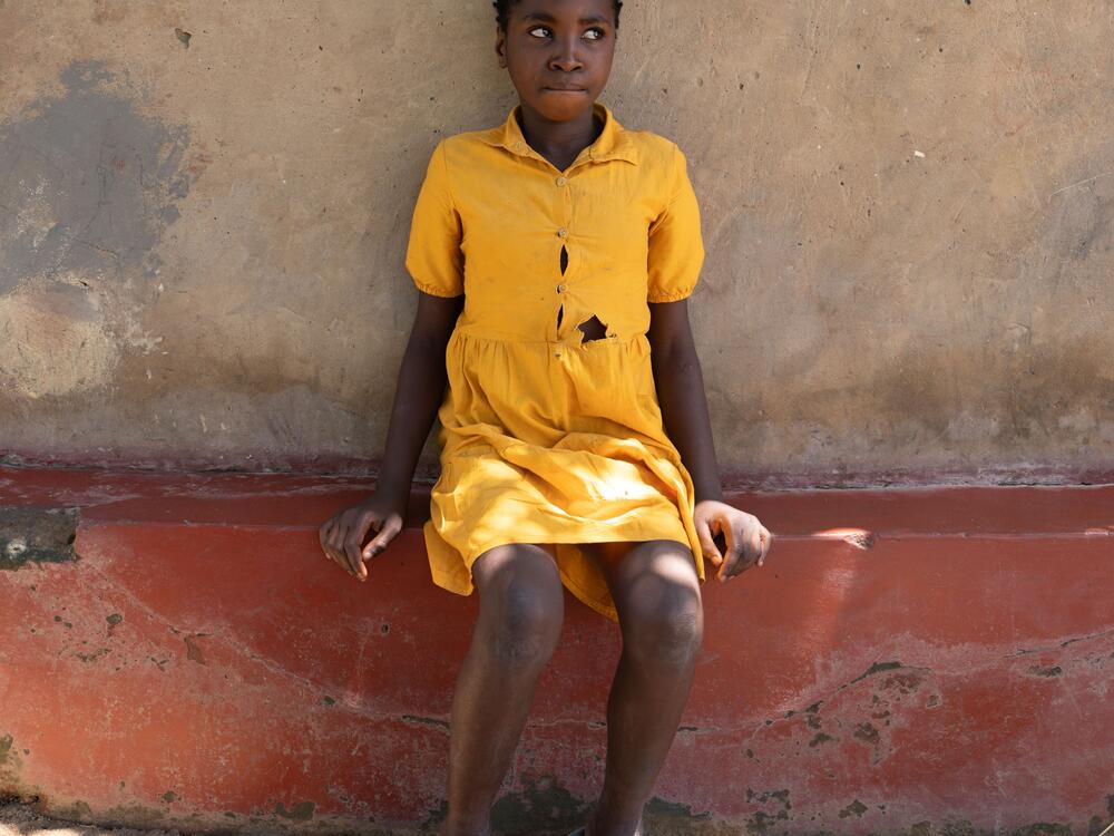 Dorcas Mwanza, 10, took the last of her HIV medications eight days ago. She's developed a fever and chills, among the first symptoms people experience when they go off HIV treatment.