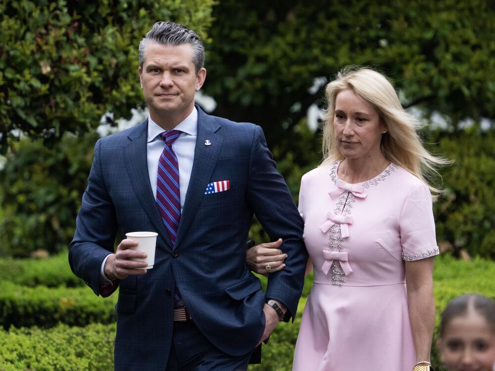 Defense Secretary Pete Hegseth and his wife, Jennifer, attend the White House Easter Egg Roll on April 21.