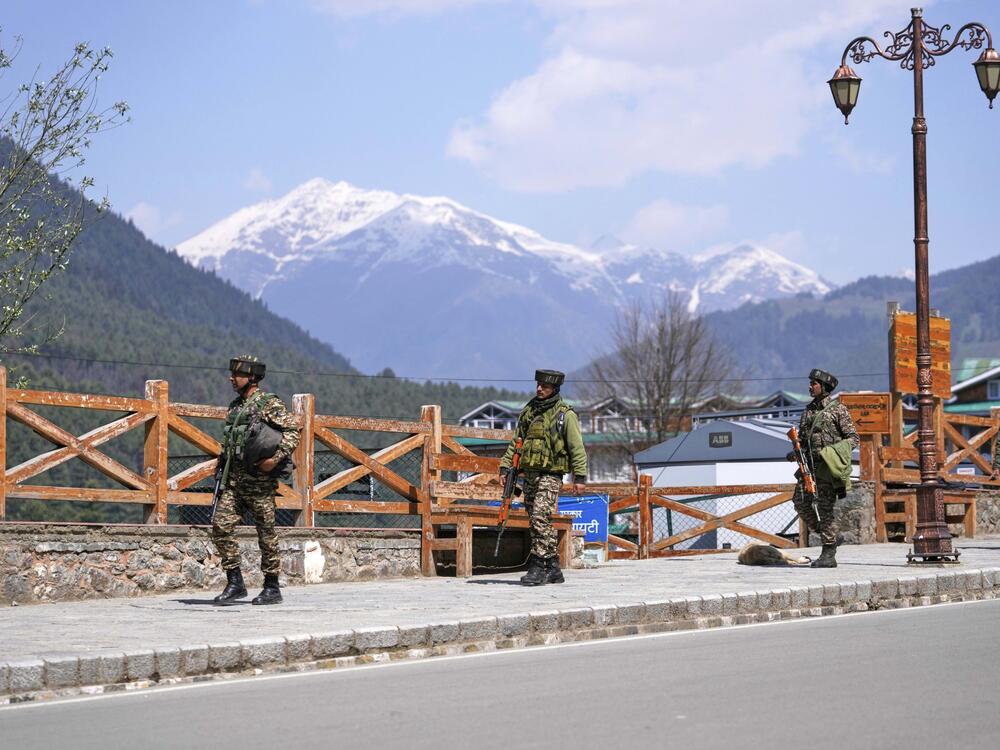 Security personnel patrol a street the morning after militants indiscriminately opened fire on tourists near Pahalgam in Indian-controlled Kashmir, April 23.