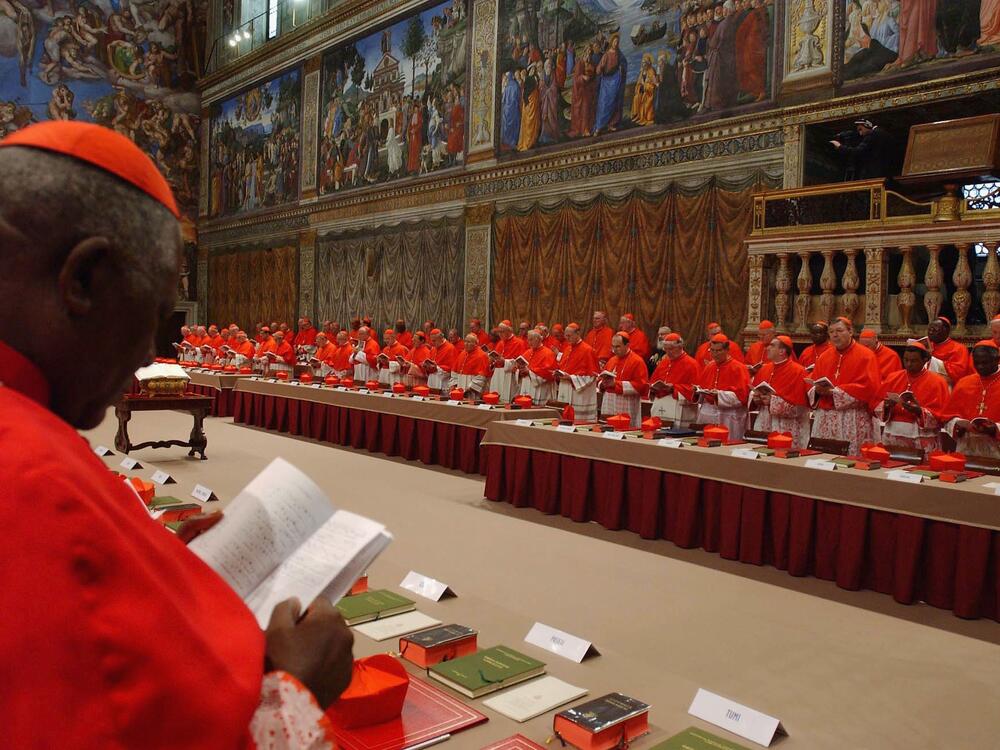 Cardinal electors attend the papal conclave inside the Sistine Chapel on April 18, 2005.