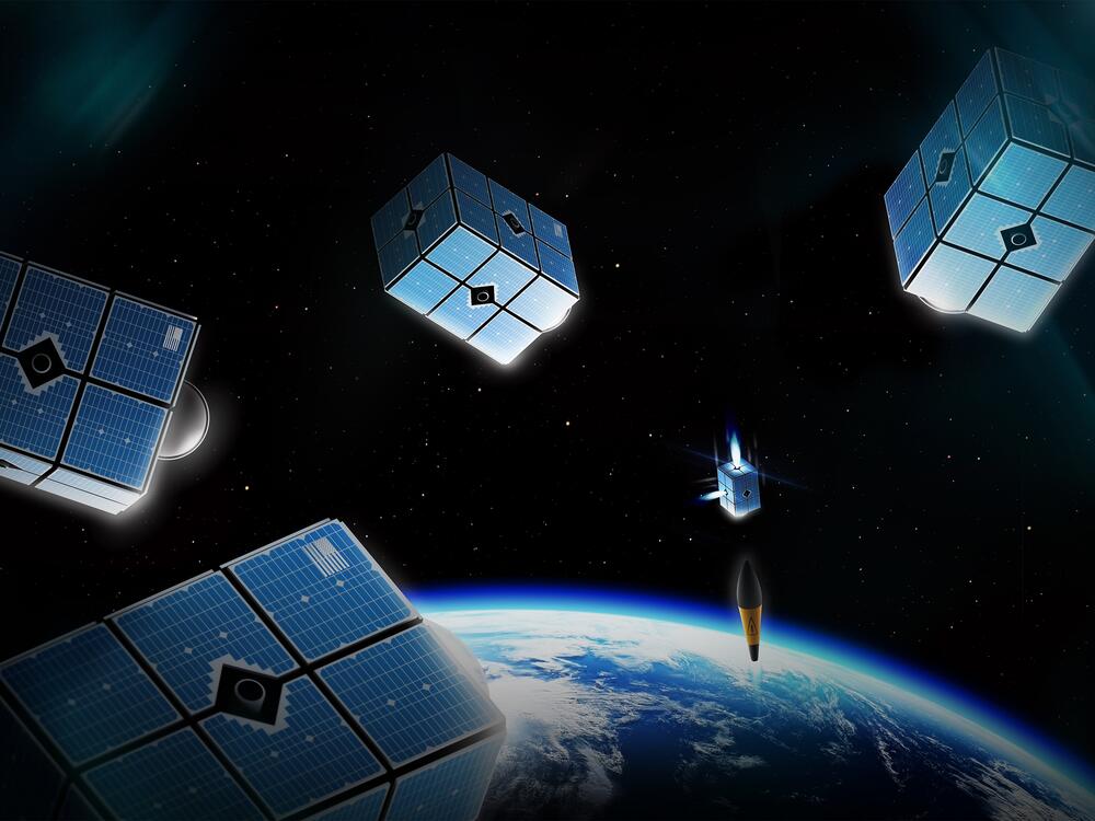An artist's rendering of Brilliant Swarms, a proposed space-based missile defense system from the firm Booz Allen Hamilton. The small cubesats would act as both sensors and interceptors to catch missiles early in flight.