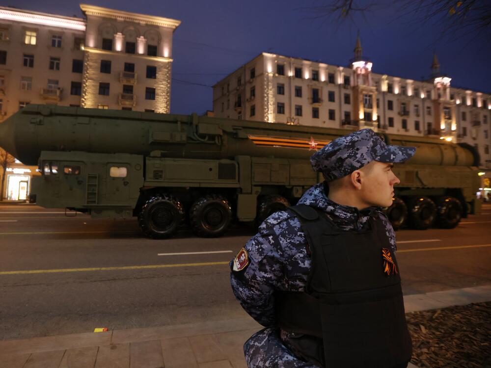 A Russian National Guard soldier stands in front of a Yars nuclear missile during Victory Day Parade dress rehearsals in 2024. The Yars is a type of intercontinental ballistic missile that can strike at hypersonic speeds.