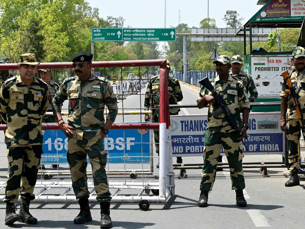 Indian Border Security Force (BSF) soldiers stand guard at the India-Pakistan Wagah border post on the outskirts of Amritsar on April 24. At least 26 people were killed April 22 in Indian-administered Kashmir when gunmen opened fire on tourists, in the region's deadliest attack on civilians since 2000.