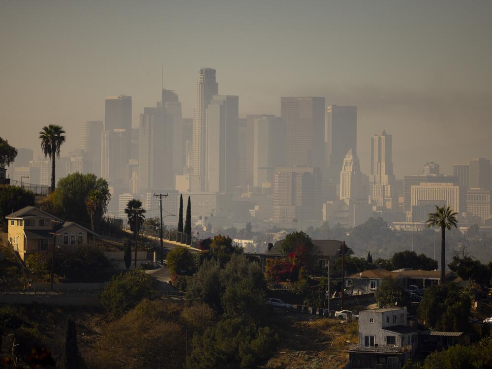 A layer of smog lingers above downtown Los Angeles in 2024. Millions of Americans are still breathing in unhealthy air, despite long-term progress toward cleaning up many sources of pollution, according to the 2025 State of the Air report.