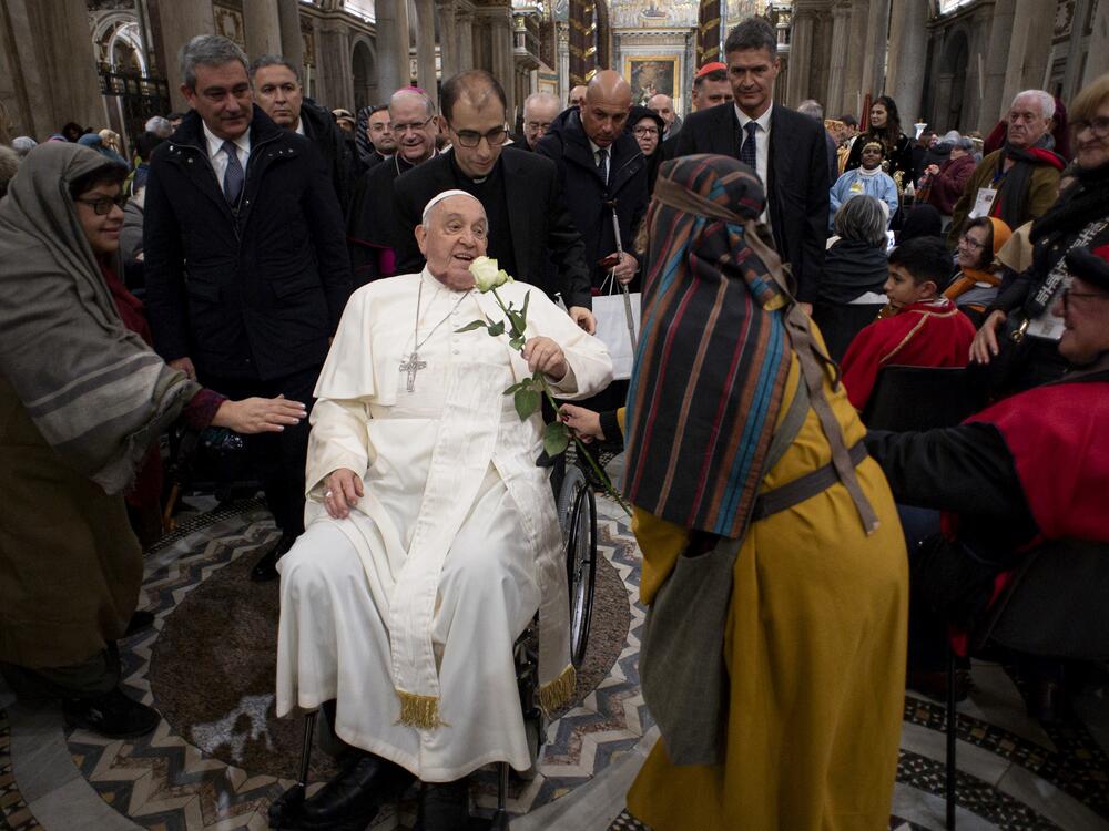Pope Francis greets participants to the Living Nativity Scene at the Basilica of St. Mary Major on December 14, 2024 in Rome, Italy. He will be laid to rest in the Basilica after his funeral in the Vatican on Saturday.