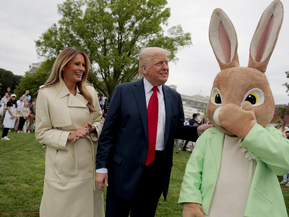 President Donald Trump, first lady Melania Trump and the Easter Bunny greet guests during the White House Egg Roll on the South Lawn of the White House on April 21.