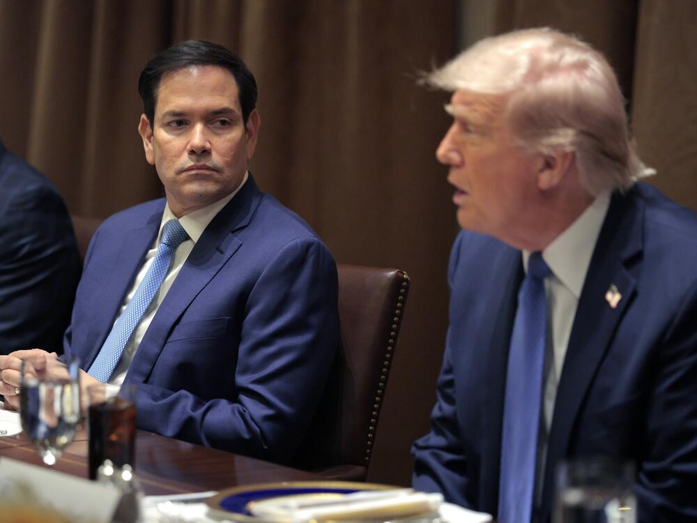 Secretary of State Marco Rubio listens as President Trump delivers remarks during a bilateral lunch with Norway's Prime Minister Jonas Gahr Store in the Cabinet Room at the White House on April 24. The leaders are expected to discuss security, trade, NATO and the war in Ukraine.