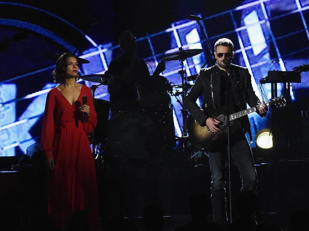 Rhiannon Giddens (left) performs with country star Eric Church during the 2016 CMA Awards in Nashville, Tenn.