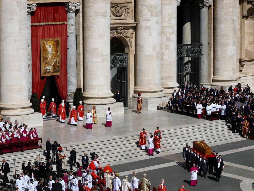 The coffin of Pope Francis is carried during the funeral Mass of Pope Francis.