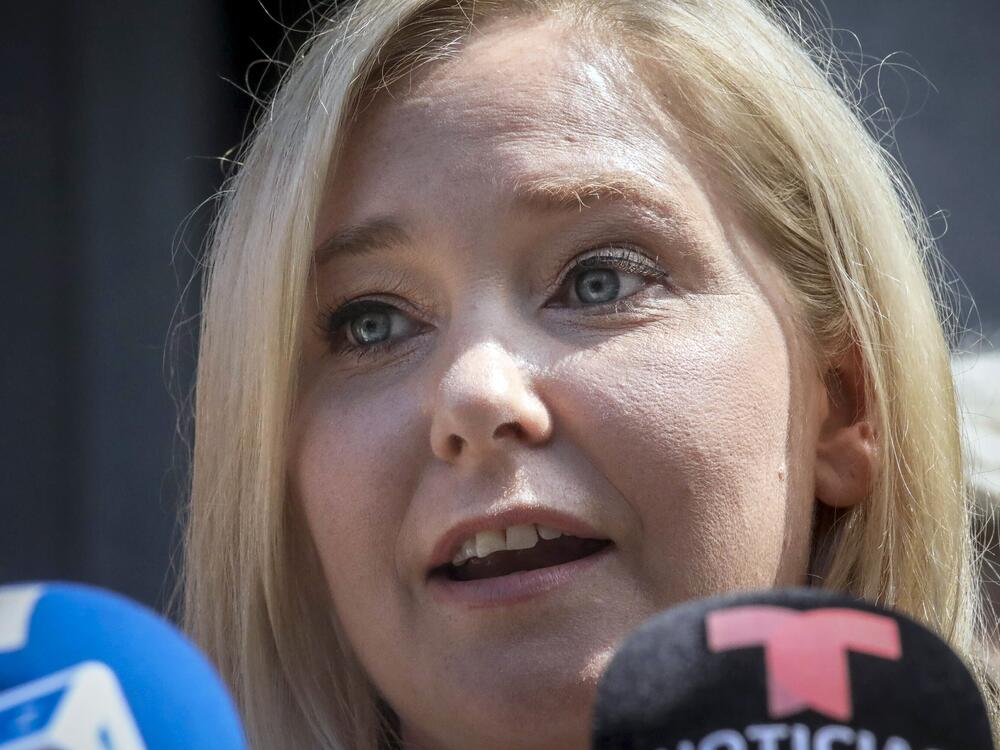 Virginia Giuffre speaks during a news conference outside a Manhattan court in New York, Aug. 27, 2019.