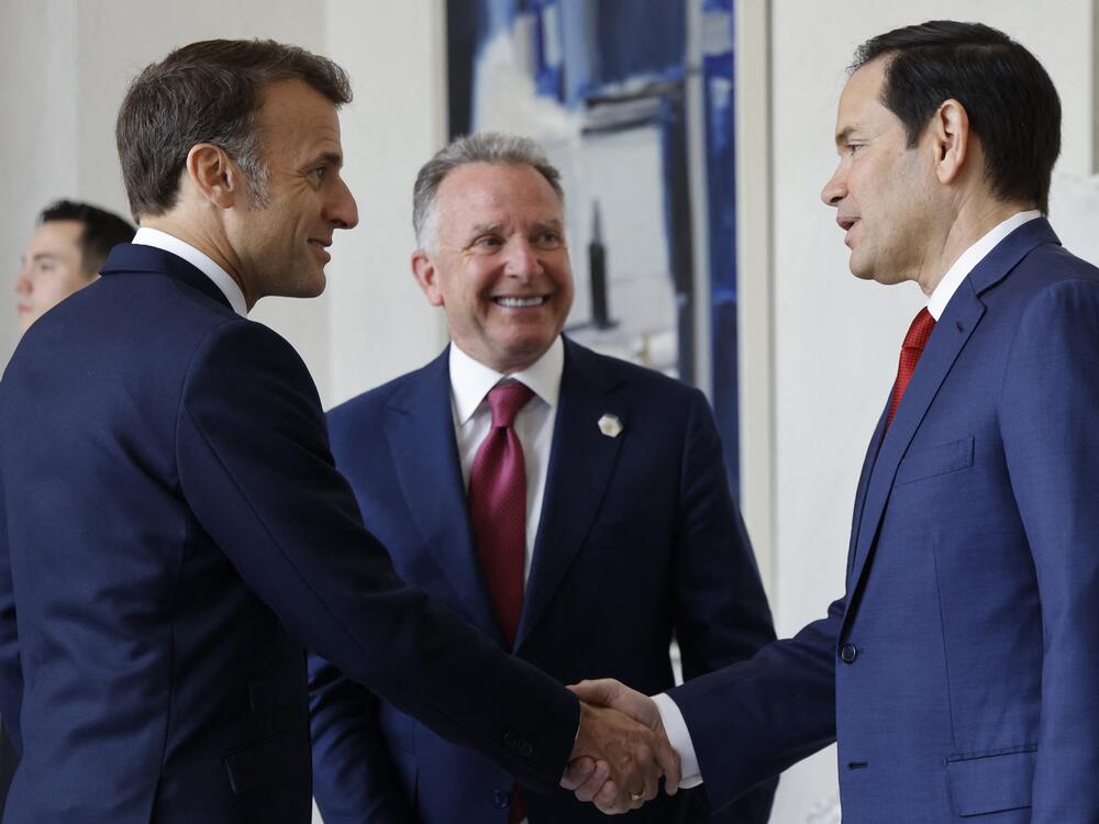 French President Emmanuel Macron shakes hands with Secretary of State Marco Rubio as Steve Witkoff looks on before a meeting about the war in Ukraine on April 17, 2025 in Paris.