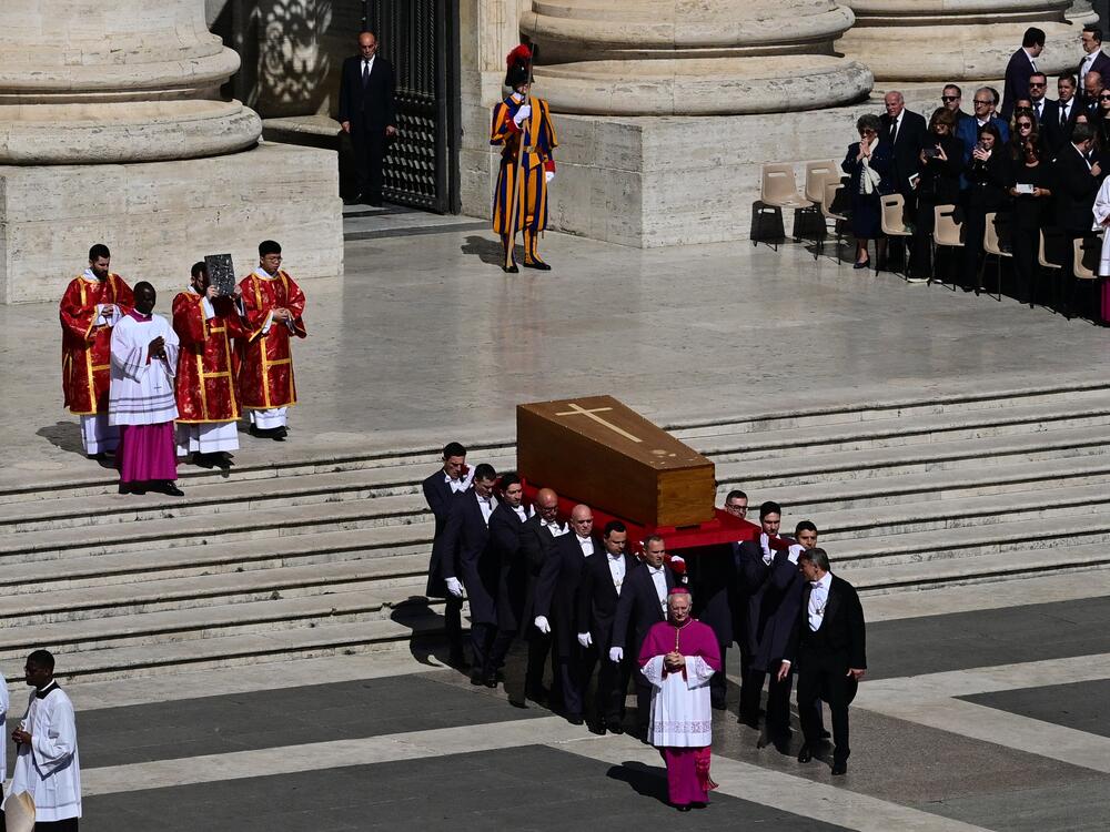 Pallbearers carry the coffin of late Pope Francis during the funeral ceremony in St Peter's Square.