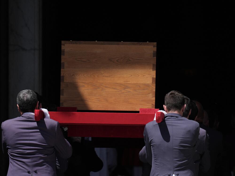 The coffin of late Pope Francis is carried by pallbearers into Santa Maria Maggiore Basilica.