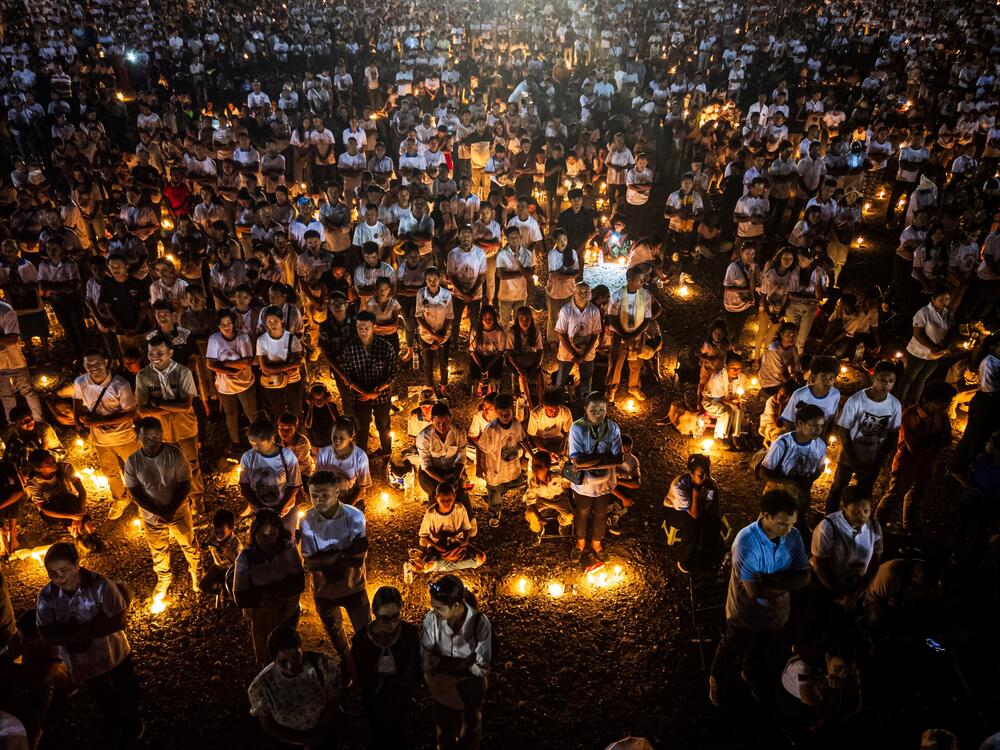 An aerial image shows Catholic believers holding candles during Pope Francis's requiem mass at the Esplanade of Tasitolu in Dili, East Timor, where he held a Mass in September last year, on April 26, 2025, as his funeral takes place in Vatican.
