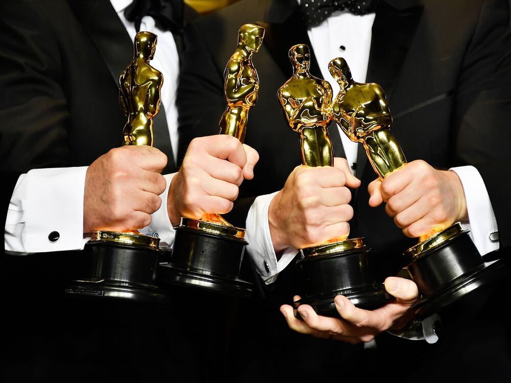 Academy members now have to watch all the nominated films in a category if they want to cast a final-round vote. Above, Oscar winners pose with their awards in 2017.